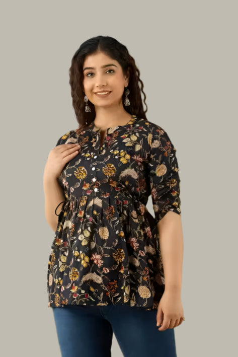 Front view of a partywear printed topper with regular sleeves for girls and women – elegant and trendy
