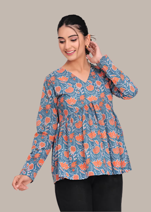 Model wearing vibrant cotton peplum top – perfect for casual or semi-formal wear